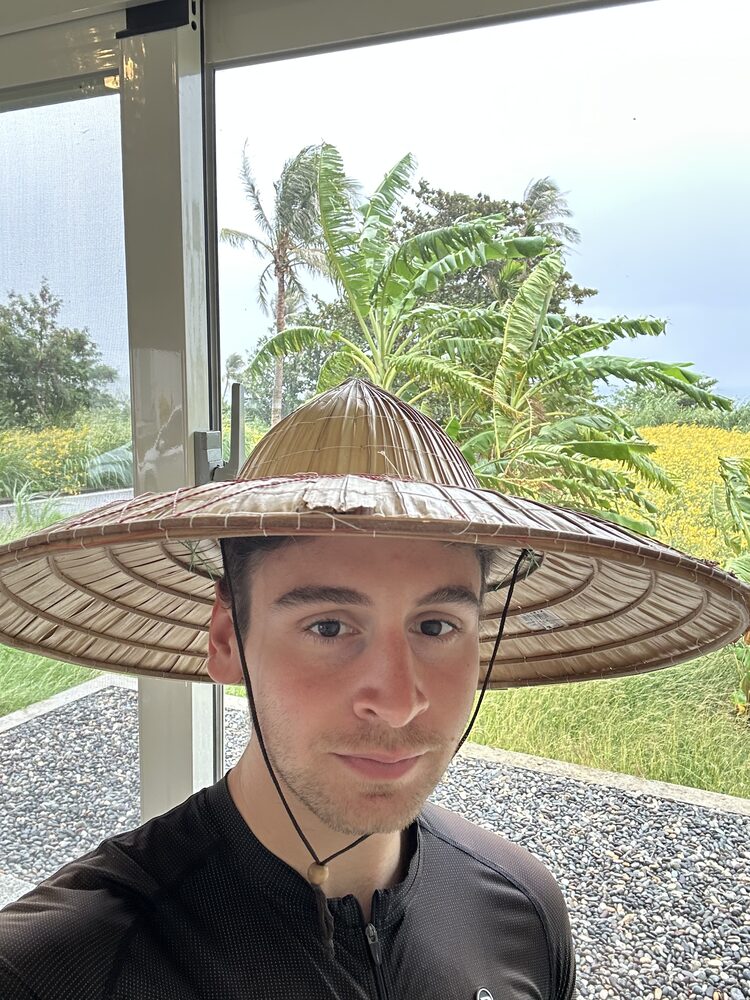 A conical straw hat, somewhere tropical