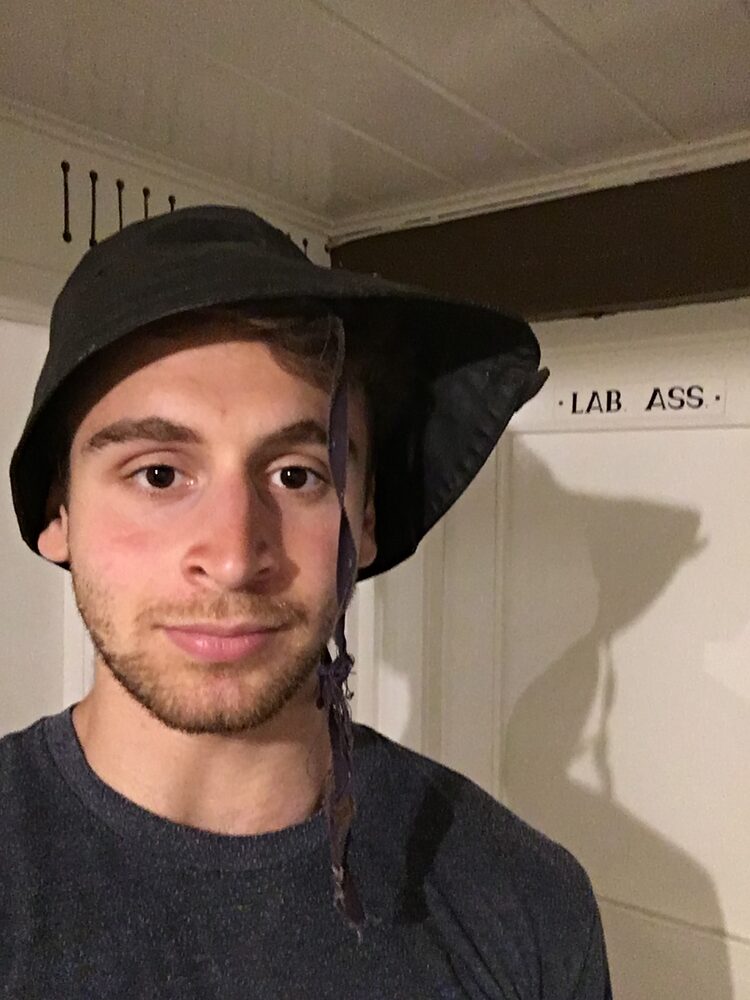 A bush hat, under a door marked LAB. ASS.