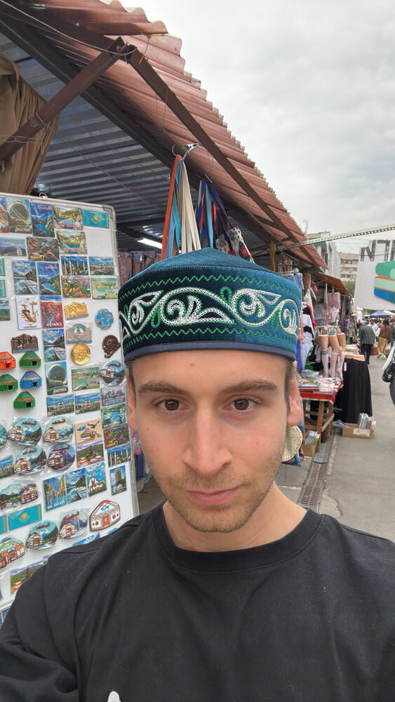 An embroidered skullcap at a souvenir market